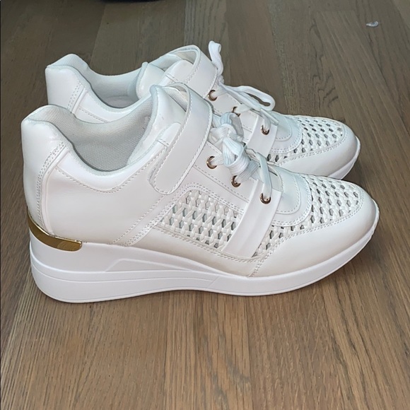 white and gold platform sneakers